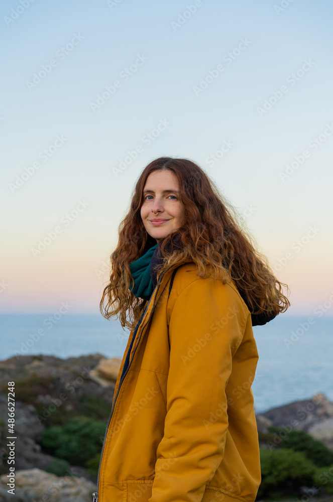 Portrait of smiley woman in nature at sunset Portrait of smiley woman in nature at sunset