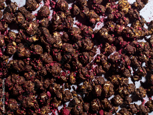 Chocolate and raspberry lavored popcorns photo