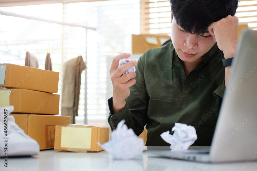 Startup small business entrepreneur feeling stress about his business result. Startup small business entrepreneur feeling stress about his business result.