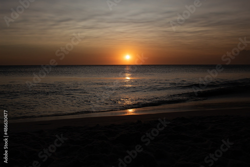 Sunset with golden reflection in the sea