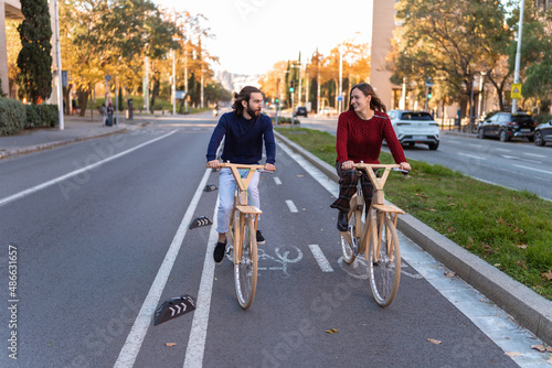 Wallpaper Mural Smiling multiracial friends riding eco bicycles Torontodigital.ca