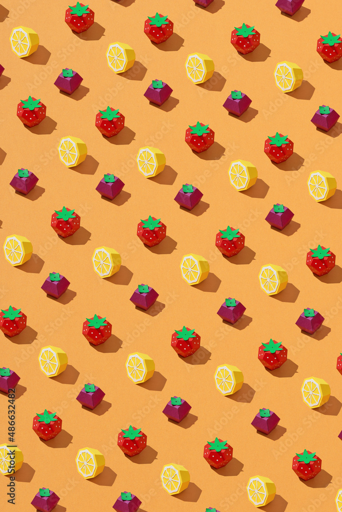 Many different berries, lemons, pears and apple on orange background Many different berries, lemons, pears and apple on orange background