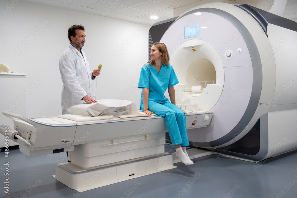 Patient consulting with doctor before MRI scan Patient consulting with doctor before MRI scan
