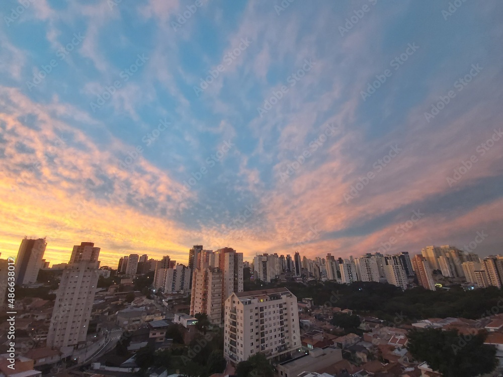 Beautiful sunrise, blue cloudy sky at downtown Sao Paulo