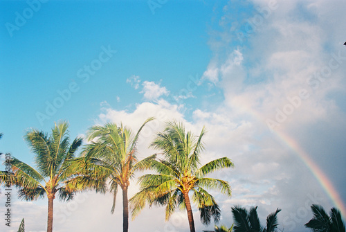 rainbow in blue sky 