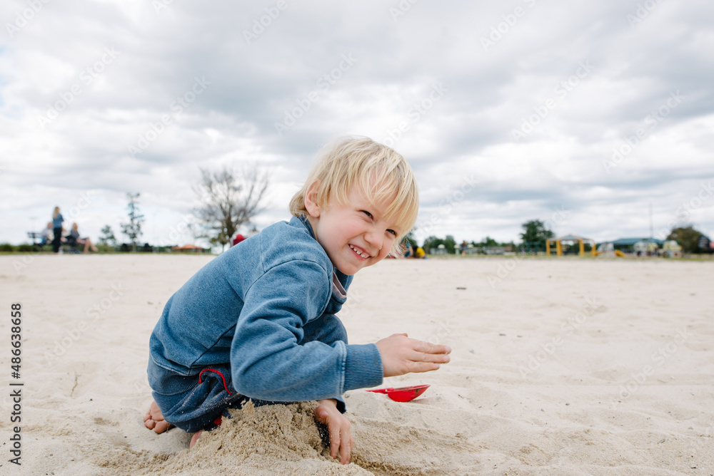 Smiling boy on sand Smiling boy on sand