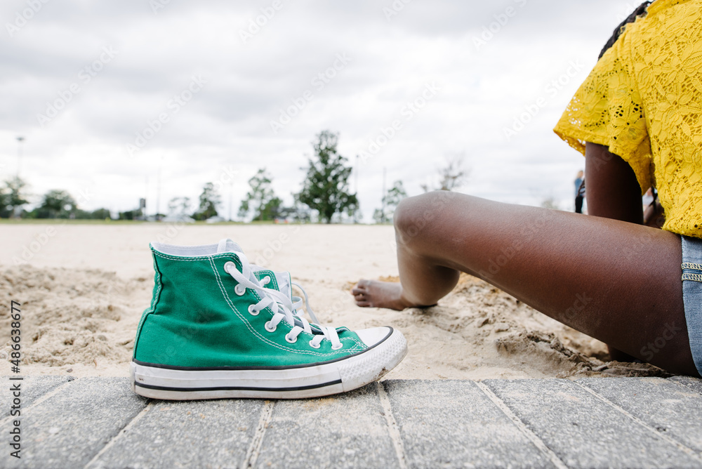 fluorescent green tennis shoes