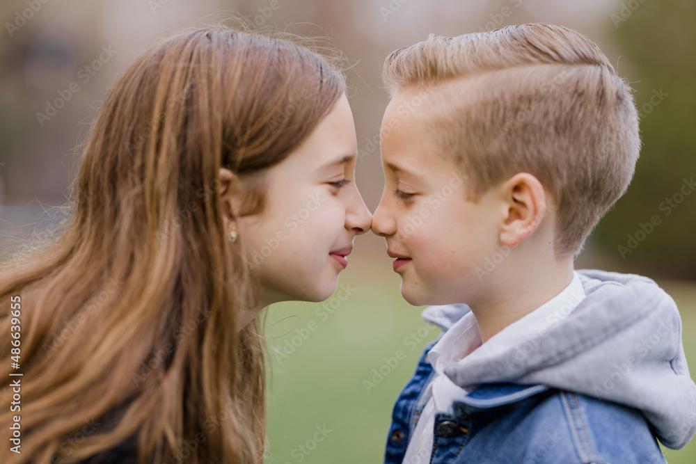 Sister and brother nose to nose Sister and brother nose to nose