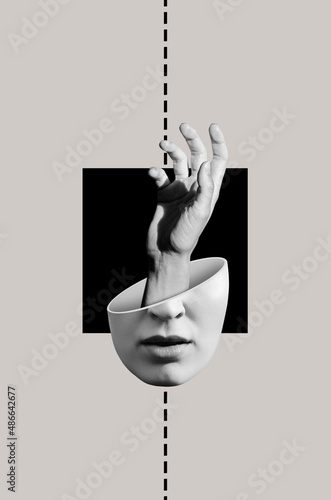 Hand in head of a woman against black square
