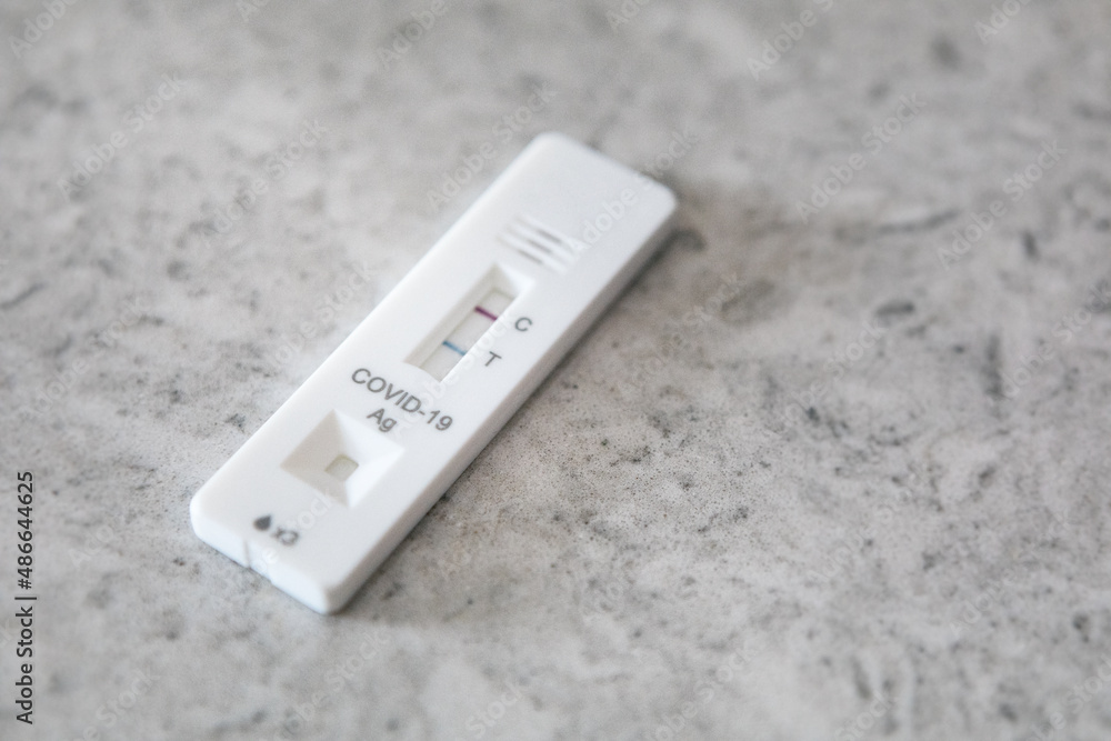 At Home Positive Covid Test On Counter Stock Photo Adobe Stock