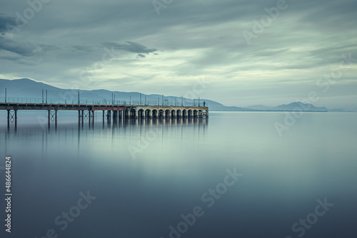 Lond Exposure Seascape with Pier during Blue Hour photo