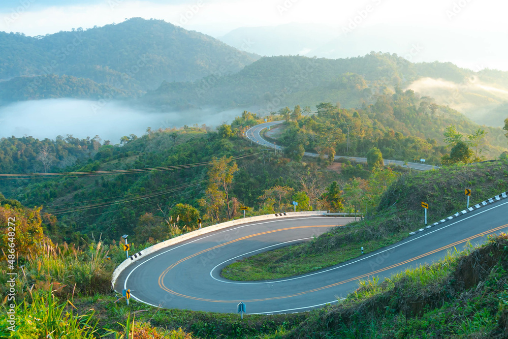 Sky road over top of mountains with green jungle in Nan province, Thailand 2022
