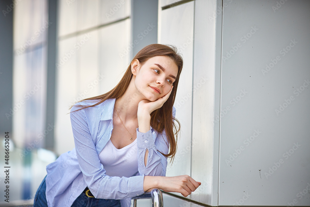 Dreaming teen girl close-up. Looks away and thinks about a good future Dreaming teen girl close-up. Looks away and thinks about a good future