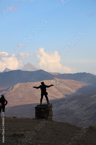 person on the top of mountain © Majid