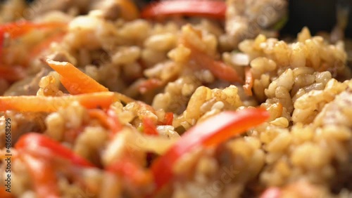 rice in teriyaki sauce close-up. korean food macro