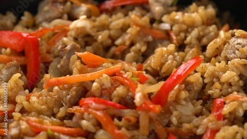 rice in teriyaki sauce close-up. korean food macro