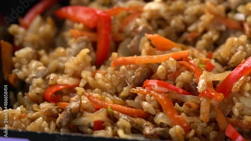 rice in teriyaki sauce close-up. korean food macro