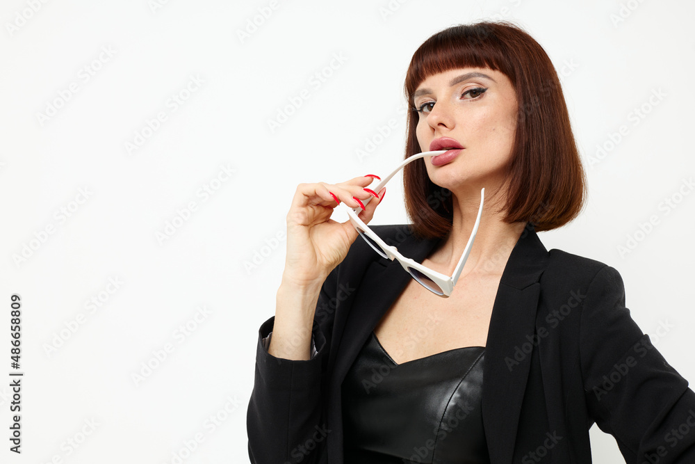 attractive woman in a black suit sunglasses luxury Lifestyle unaltered