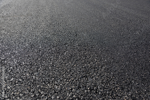 Asphalt road low angle pavement background view