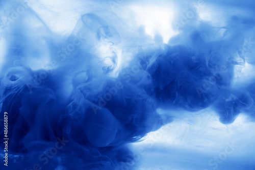 Art ink in water abstract background texture , colored smoke