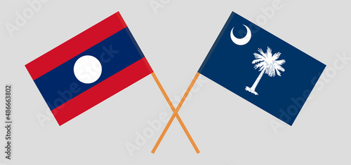 Crossed flags of Laos and The State of South Carolina. Official colors. Correct proportion