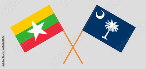 Crossed flags of Myanmar and The State of South Carolina. Official colors. Correct proportion