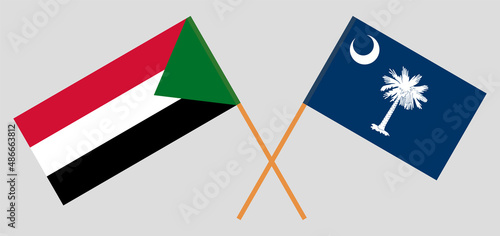 Crossed flags of the Sudan and The State of South Carolina. Official colors. Correct proportion