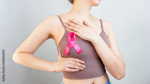 Wallpaper Mural World Breast Cancer Day. prevention of breast cancer. manual examination of the breast. a woman makes a manual examination of the breast. pink ribbon as symbol of world breast cancer day.
 Torontodigital.ca