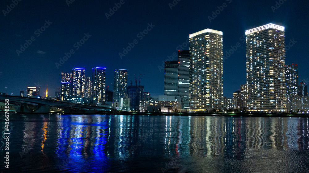 Night view of a high-rise condominium along an urban river_01 Night view of a high-rise condominium along an urban river_01