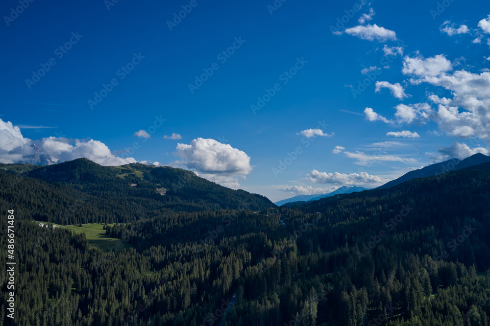 Panorama of beautiful countryside of Italy. High mountains in the Europe. Landscape with mountain pastures.