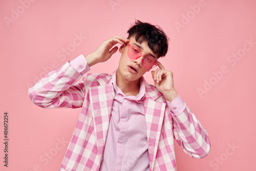 Photo of romantic young boyfriend fashionable pink sunglasses jacket posing Lifestyle unaltered