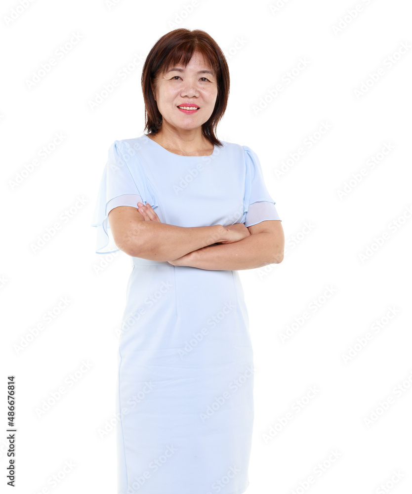 Studio closeup cutout isolated shot of Asian friendly senior grandmother female model in casual outfit standing smiling on white background. Studio closeup cutout isolated shot of Asian friendly senior grandmother female model in casual outfit standing smiling on white background.