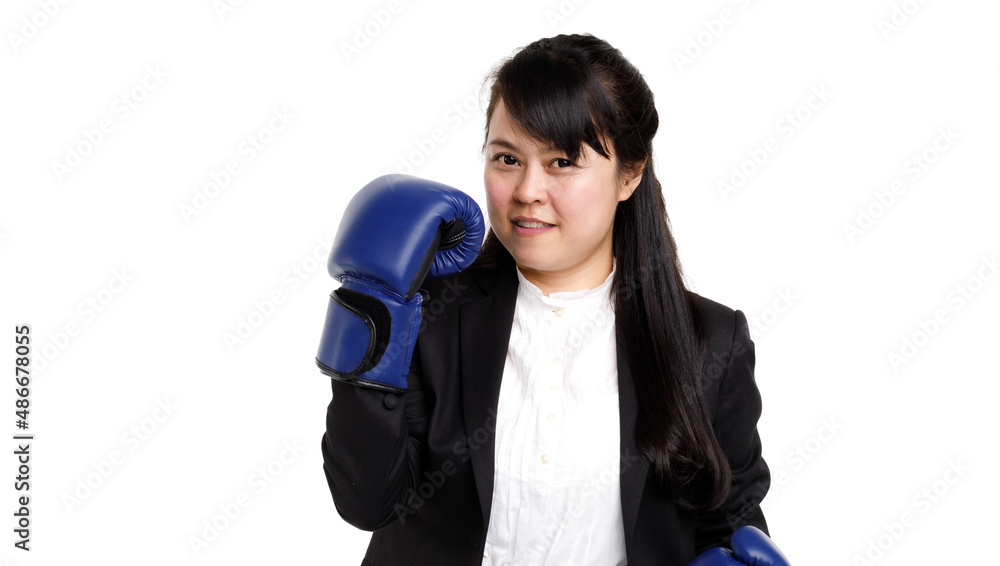 Portrait studio cutout isolated shot Asian young female businesswoman in formal suit with boxing gloves smiling holding fists up showing strong attitude to fight in business war on white background Portrait studio cutout isolated shot Asian young female businesswoman in formal suit with boxing gloves smiling holding fists up showing strong attitude to fight in business war on white background