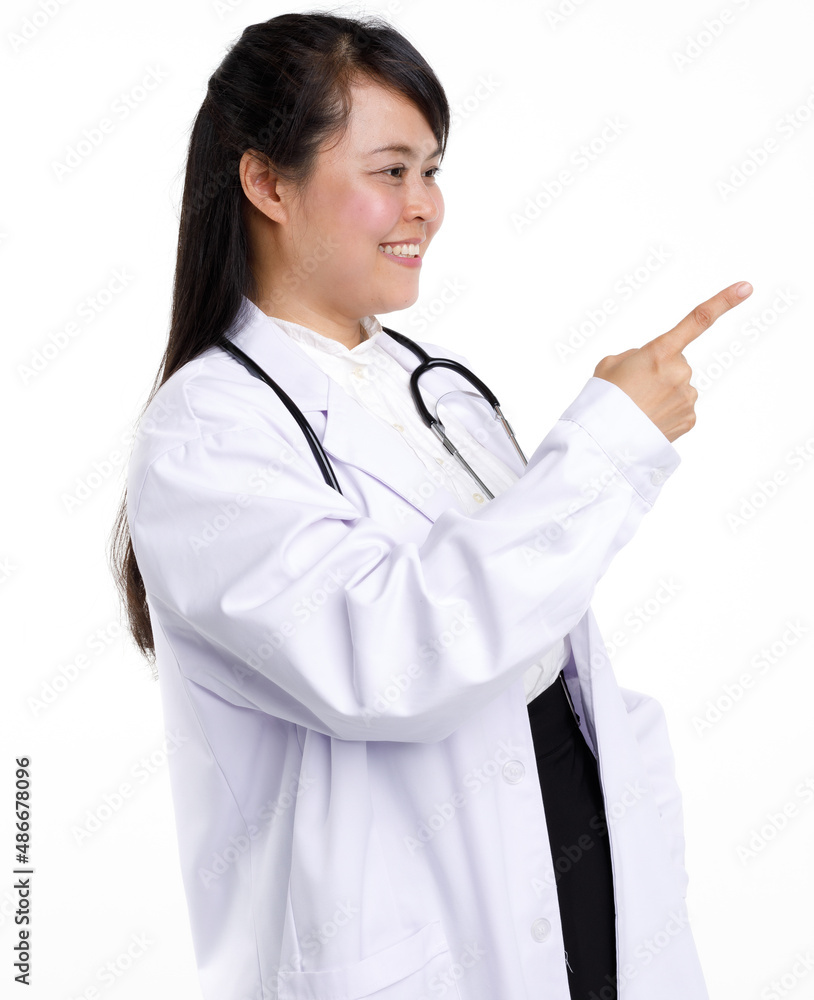 Portrait studio cutout isolated shot Asian young professional experienced female doctor in lab coat uniform with stethoscope smiling look at camera holding hand showing thumb up on white background Portrait studio cutout isolated shot Asian young professional experienced female doctor in lab coat uniform with stethoscope smiling look at camera holding hand showing thumb up on white background