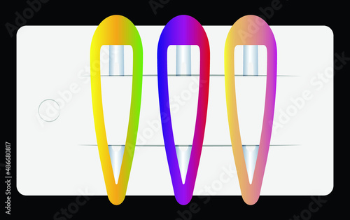 set of multi-colored hairpins on white cardboard 