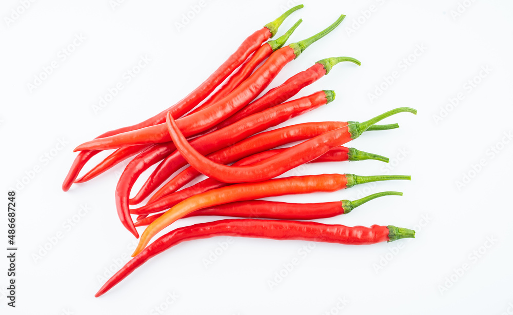 Fresh red peppers on white background Fresh red peppers on white background