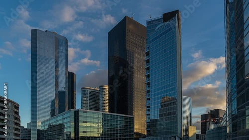 Sunny and Cloudy Sunset Over La Defense Business District Paris Buildings Reflections