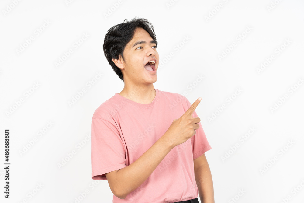 Presenting or Pointing Product Aside of Asian Man Wearing T-Shirt Isolated On White Background Presenting or Pointing Product Aside of Asian Man Wearing T-Shirt Isolated On White Background