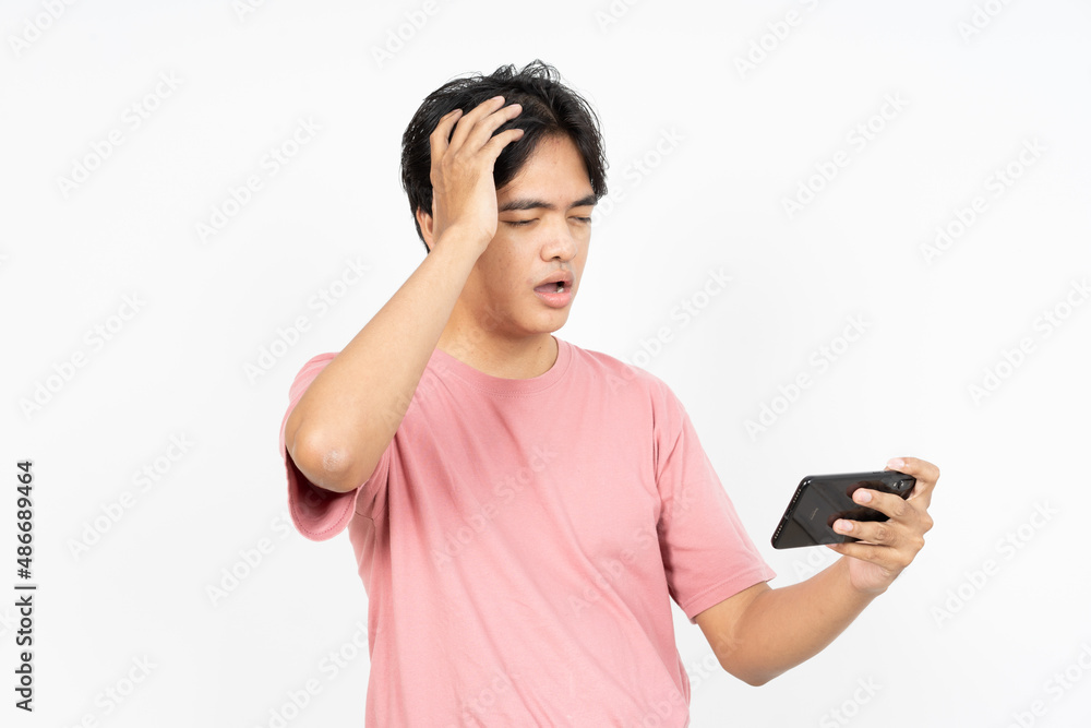 Playing Games On Smartphone Of Asian man Isolated On White Background Playing Games On Smartphone Of Asian man Isolated On White Background