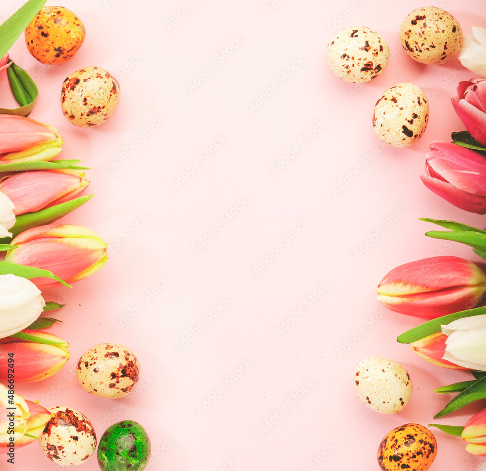 Spring Easter composition with pink tulips flowers and eggs on pastel background. Bannner top view, copy space