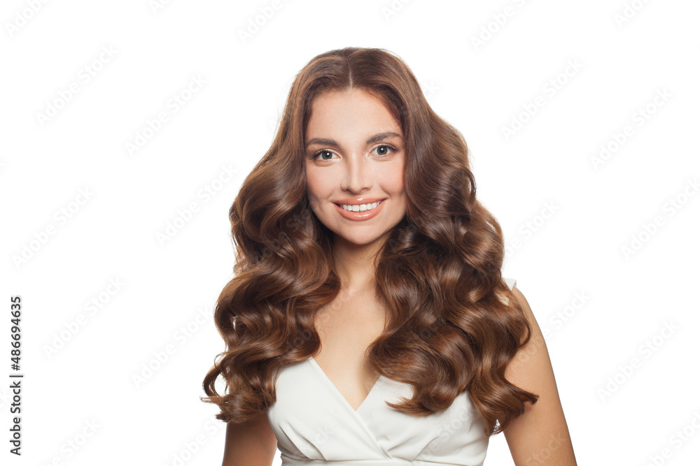 Obraz premium Beautiful curly hair model. Cute woman with wavy long hair isolated on white background portrait