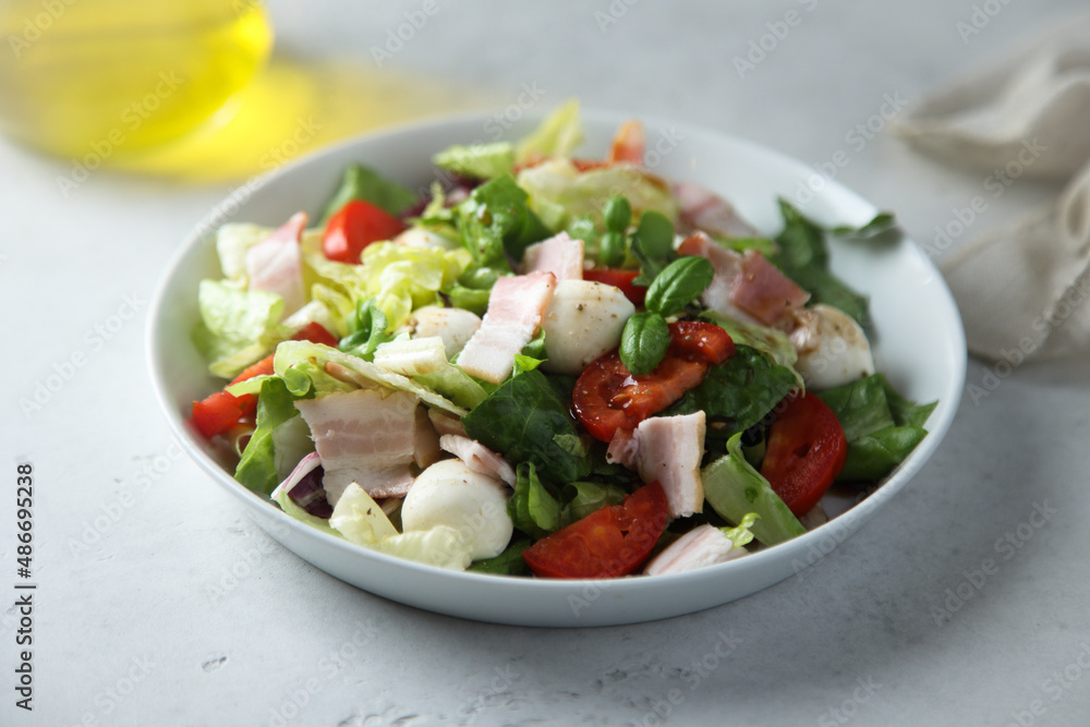 Vegetable salad with bacon and mozzarella Vegetable salad with bacon and mozzarella