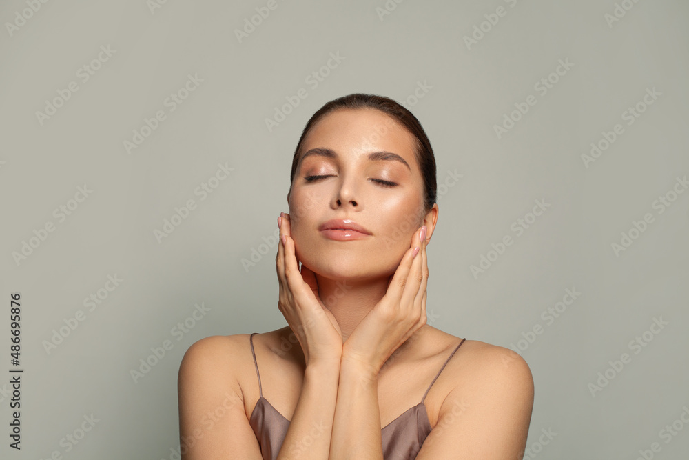 Attractive woman relaxing. Spa model with healthy skin and closed eyes Attractive woman relaxing. Spa model with healthy skin and closed eyes