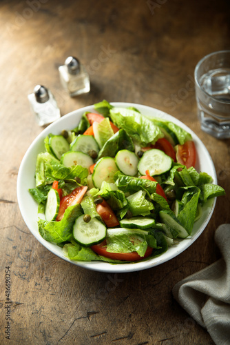 Healthy vegetable salad with tomato and cucumber