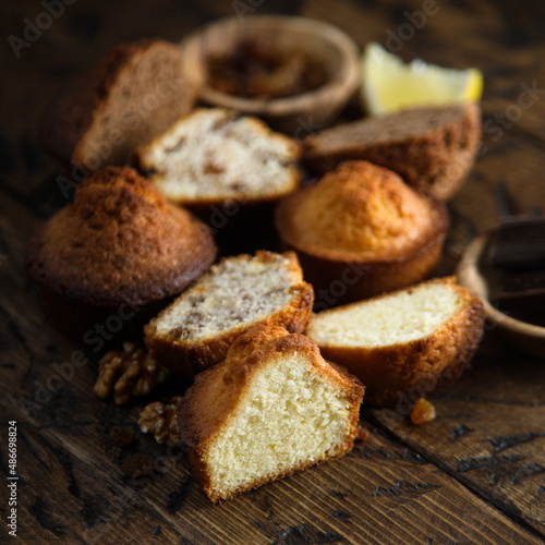 Homemade assorted muffins with lemon, cinnamon and nuts