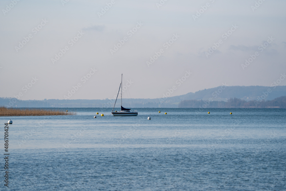 Sailing Boat on the lake of biel - obrazy, fototapety, plakaty 
