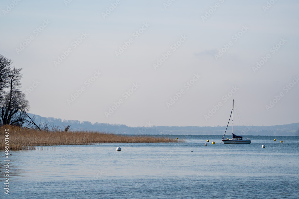 Sailing Boat on the lake of biel - obrazy, fototapety, plakaty 