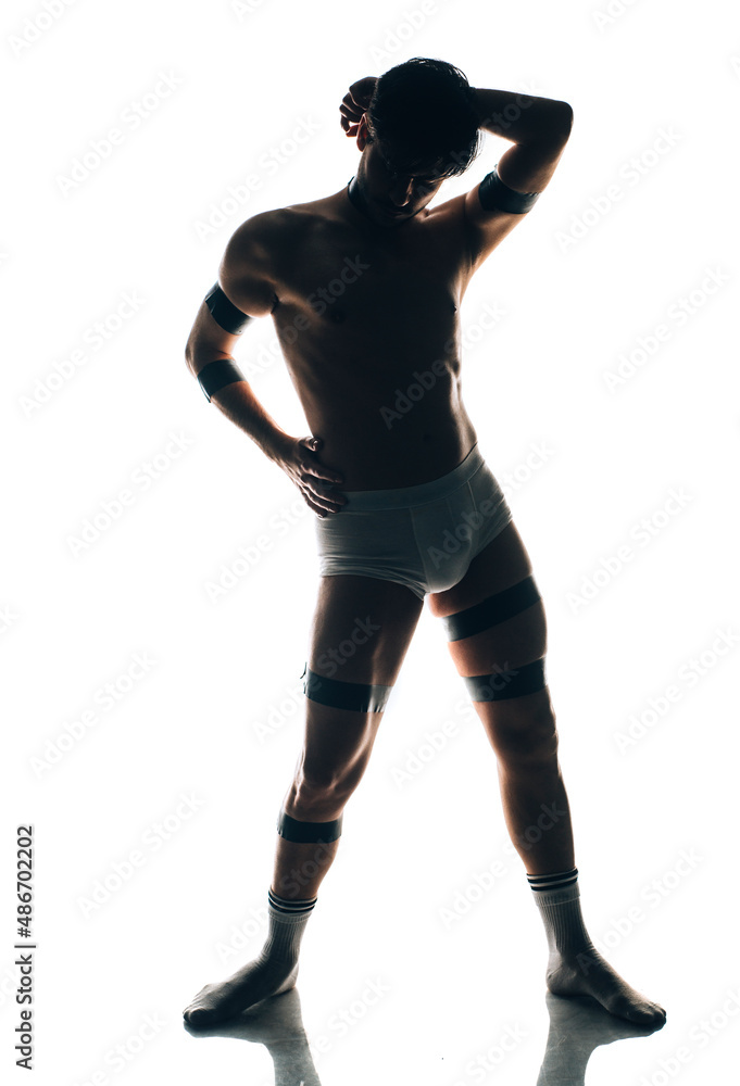 Handsome man posing in underwear on white background Handsome man posing in underwear on white background