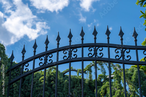 Obraz na plátně Decorative wrought iron fence. With blue sky.