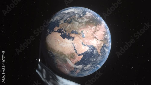 Visualization of the end of the pandemic, the removal mask regime, cancellation of quarantine. Medical mask falls from the planet earth. 4K 3D animation. Elements of this image furnished by NASA.